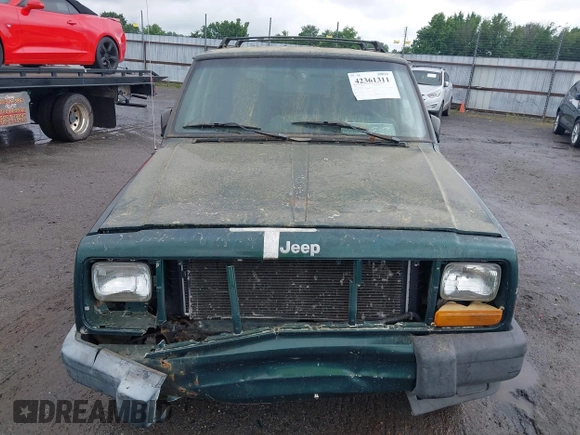2000 Jeep Cherokee with VIN 1J4FT48S4YL240347, listed as a IAAI auction lot 42361311 with Not provided miles and . Bid and sale history available at DreamBid. Image 6.