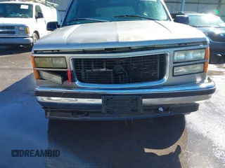 1998 GMC Yukon with VIN 1GKEK13R4WJ725608, listed as a IAAI auction lot 41596559 with 323,141 mi miles. Bid and sale history available at carsss.com. Image 13.