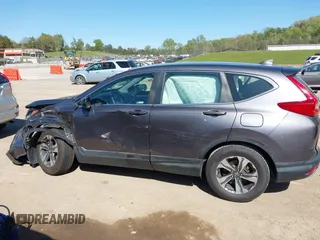 2019 Honda CR-V LX with VIN 2HKRW5H32KH410676, listed as a IAAI auction lot 42038654 with 94,342 mi miles. Bid and sale history available at carsss.com. Image 14.