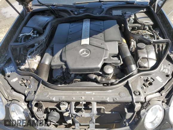 2003 Mercedes-Benz E-Class 5.0L with VIN WDBUF70J53A199951, listed as a Copart auction lot 51138595 with 129,414 mi miles and Salvage Title. Bid and sale history available at carsss.com. Image 11.
