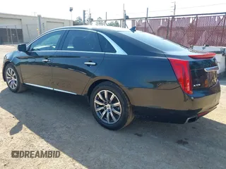2013 Cadillac XTS Premium z VIN 2G61S5S34D9127996, wystawiony jako IAAI lot #41978539 z przebiegiem 185 157 mil mil oraz . Historia ofert i sprzedaży dostępna na DreamBid. Obrazek 3.