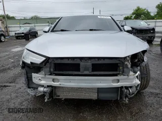2017 Audi A4 Premium z VIN WAUANAF46HN027236, wystawiony jako Copart lot #60141515 z przebiegiem 103 700 mil mil oraz Szkoda całkowita • Salvage title. Historia ofert i sprzedaży dostępna na DreamBid. Obrazek 5.