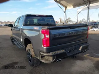 2021 Chevrolet Silverado 1500 LT Trail Boss with VIN 1GCPYFED1MZ449887, listed as a IAAI auction lot 41761670 with 57,324 mi miles and . Bid and sale history available at DreamBid. Image 3.