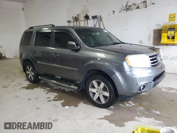 2013 Honda Pilot Touring z VIN 5FNYF3H93DB019252, wystawiony jako Copart lot #64631715 z przebiegiem 134 343 mil mil oraz Szkoda całkowita • Salvage title. Historia ofert i sprzedaży dostępna na DreamBid. Obrazek 4.