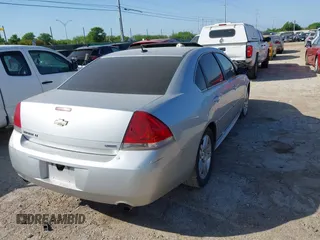 2014 Chevrolet Impala LT with VIN 2G1WB5E32E1146716, listed as a IAAI auction lot 41967440 with 143,593 mi miles and . Bid and sale history available at DreamBid. Image 4.