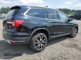 2020 Honda Pilot Touring 8-Passenger with VIN 5FNYF5H95LB021658, listed as a Copart auction lot 58878594 with 36,122 mi miles and Salvage Title. Bid and sale history available at DreamBid. Image 3.