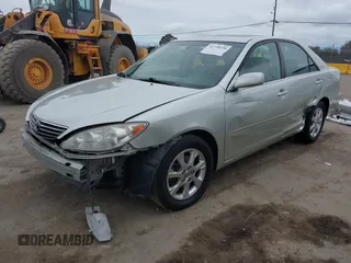2005 Toyota Camry LE with VIN JTDBF30K650163057, listed as a IAAI auction lot 41730270 with 98,300 mi miles and . Bid and sale history available at DreamBid. Image 2.