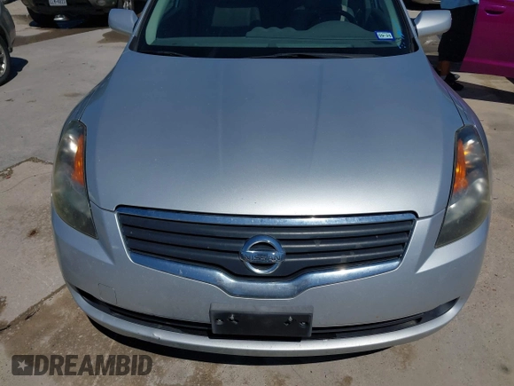 2007 Nissan Altima 2.5 with VIN 1N4AL21E27C138140, listed as a IAAI auction lot 42083098 with 189,799 mi miles. Bid and sale history available at carsss.com. Image 6.