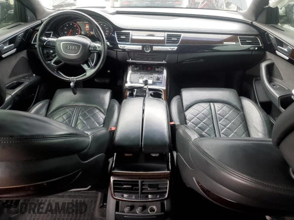 2017 Audi A8 Sport z VIN WAU43AFD2HN003499, wystawiony jako Copart lot #88994855 z przebiegiem 93 734 mil mil oraz Szkoda całkowita • Salvage title. Historia ofert i sprzedaży dostępna na DreamBid. Obrazek 8.