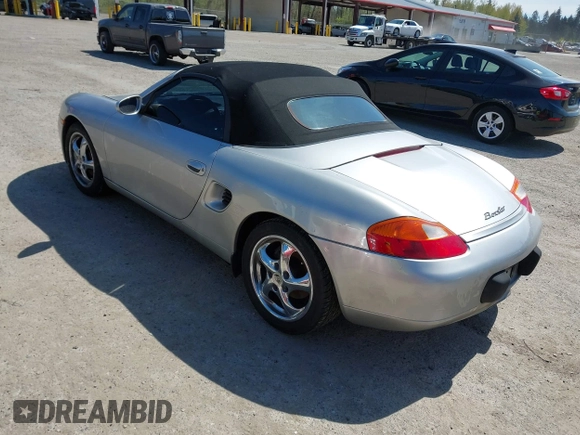 1998 Porsche Boxster с VIN WP0CA2983WU624195, выставлен на аукционе IAAI как лот 42036411 с пробегом 159 202 миль миль и . История ставок и продаж доступна на DreamBid. Изображение 3.