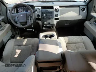2009 Ford F-150 STX with VIN 1FTRX12869FB02974, listed as a Copart auction lot 52781725 with 130,583 mi miles and Salvage title. Bid and sale history available at DreamBid. Image 8.