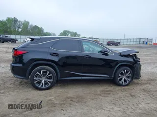 2016 Lexus RX 350 z VIN 2T2ZZMCA8GC005158, wystawiony jako IAAI lot #42105589 z przebiegiem 125 337 mil mil oraz . Historia ofert i sprzedaży dostępna na DreamBid. Obrazek 12.