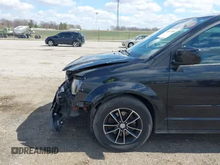 2017 Dodge Grand Caravan SXT with VIN 2C4RDGCG8HR756271, listed as a IAAI auction lot 41877283 with 136,598 mi miles and . Bid and sale history available at DreamBid. Image 6.