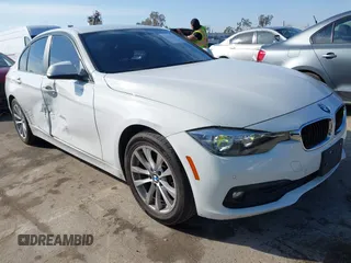 2016 BMW 3 Series 320i with VIN WBA8A9C59GK615704, listed as a IAAI auction lot 41431347 with 76,827 mi miles. Bid and sale history available at carsss.com. Image 1.