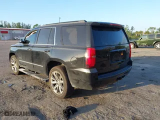 2018 Chevrolet Tahoe LT with VIN 1GNSCBKC1JR365875, listed as a IAAI auction lot 41584072 with 61,957 mi miles. Bid and sale history available at carsss.com. Image 3.