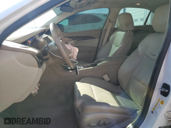2015 Cadillac ATS Luxury RWD z VIN 1G6AB5RX1F0130084, wystawiony jako Copart lot #49819265 z przebiegiem 64 423 mil mil oraz Szkoda całkowita • Salvage title. Historia ofert i sprzedaży dostępna na DreamBid. Obrazek 7.