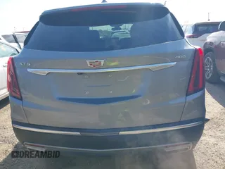 2025 Cadillac XT5 FWD Premium Luxury with VIN 1GYKNCRS1SZ120351, listed as a IAAI auction lot 41334881 with 4,915 mi miles. Bid and sale history available at carsss.com. Image 16.
