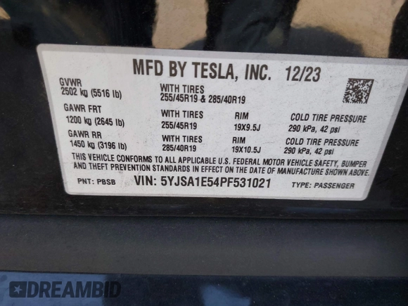 2023 Tesla Model S with VIN 5YJSA1E54PF531021, listed as a IAAI auction lot 42014104 with Not provided miles and . Bid and sale history available at DreamBid. Image 9.