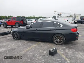 2016 BMW 4 Series 428i xDrive with VIN WBA4C9C58GG136248, listed as a IAAI auction lot 41346270 with 129,464 mi miles and . Bid and sale history available at carsss.com. Image 15.