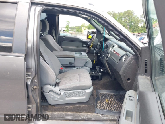 2013 Ford F-150 XL with VIN 1FTFW1ET6DKG16961, listed as a IAAI auction lot 42252221 with 187,924 mi miles and . Bid and sale history available at DreamBid. Image 5.
