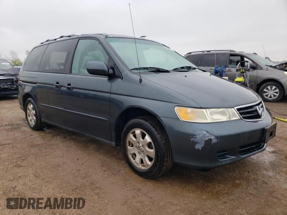 2004 Honda Odyssey EX-L z VIN 5FNRL18924B040028, wystawiony jako Copart lot #55338715 z przebiegiem 242 055 mil mil oraz Szkoda całkowita • Salvage title. Historia ofert i sprzedaży dostępna na DreamBid. Obrazek 4.
