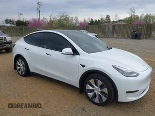 2021 Tesla Model Y Long Range with VIN 5YJYGDEE6MF122363, listed as a IAAI auction lot 41952018 with 54,263 mi miles and . Bid and sale history available at carsss.com. Image 1.