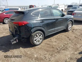 2019 Hyundai Tucson SE with VIN KM8J2CA4XKU852946, listed as a IAAI auction lot 41784214 with 120,857 mi miles. Bid and sale history available at carsss.com. Image 4.