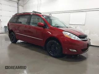 2009 Toyota Sienna XLE with VIN 5TDBK22C79S022576, listed as a IAAI auction lot 42064187 with 135,877 mi miles. Bid and sale history available at carsss.com. Image 1.