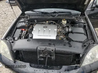 2004 Cadillac DeVille z VIN 1G6KD54Y54U132926, wystawiony jako Copart lot #53574365 z przebiegiem 123 848 mil mil oraz Tytuł czysty. Historia ofert i sprzedaży dostępna na DreamBid. Obrazek 11.
