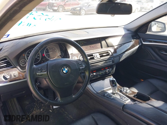 2013 BMW 5 Series 528i with VIN WBAXG5C55DDY33772, listed as a IAAI auction lot 41605701 with 131,473 mi miles and . Bid and sale history available at carsss.com. Image 13.