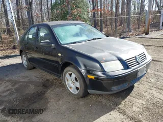 1999 Volkswagen Jetta z VIN 3VWSC29M6XM060760, wystawiony jako IAAI lot #41711951 z przebiegiem Nie podano mil oraz . Historia ofert i sprzedaży dostępna na DreamBid. Obrazek 1.