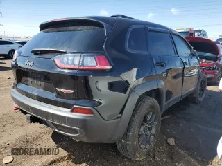 2022 Jeep Cherokee Trailhawk with VIN 1C4PJMBX9ND516418, listed as a Copart auction lot 49733765 with 55,624 mi miles and Salvage title. Bid and sale history available at DreamBid. Image 3.