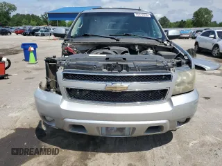 2011 Chevrolet Suburban LT с VIN 1GNSCJE00BR213311, выставлен на аукционе Copart как лот 55612835 с пробегом 219 379 миль миль и Списание • Salvage title. История ставок и продаж доступна на DreamBid. Изображение 5.