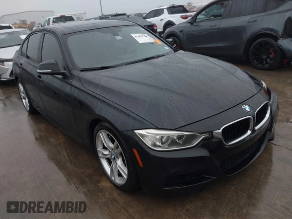 2014 BMW 3 Series 335i with VIN WBA3A9C57EF477662, listed as a IAAI auction lot 41435544 with 129,543 mi miles. Bid and sale history available at carsss.com. Image 1.