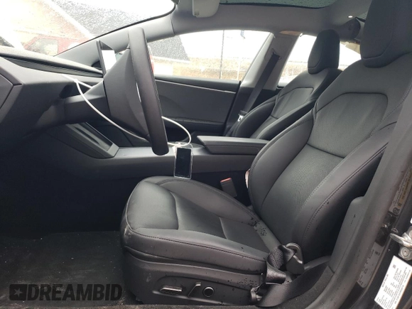2024 Tesla Model 3 with VIN 5YJ3E1EA7RF858716, listed as a Copart auction lot 49809325 with 9,936 mi miles and Non Repairable. Bid and sale history available at DreamBid. Image 7.