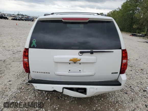 2012 Chevrolet Suburban LT с VIN 1GNSCJE09CR234272, выставлен на аукционе Copart как лот 55577005 с пробегом 118 796 миль миль и Списание • Salvage title. История ставок и продаж доступна на DreamBid. Изображение 6.