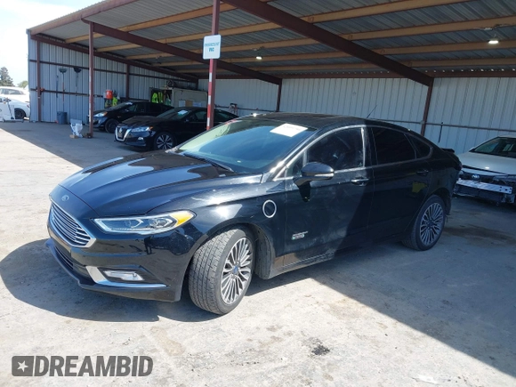 2017 Ford Fusion Energi SE with VIN 3FA6P0PU4HR380184, listed as a IAAI auction lot 42099750 with 126,175 mi miles. Bid and sale history available at carsss.com. Image 2.