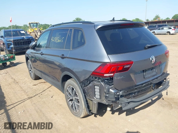 2021 Volkswagen Tiguan S with VIN 3VV0B7AX3MM038342, listed as a IAAI auction lot 42545665 with 66,809 mi miles and . Bid and sale history available at DreamBid. Image 3.