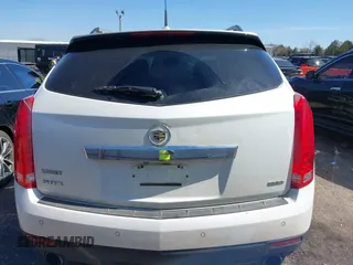 2014 Cadillac SRX Performance Collection with VIN 3GYFNCE36ES527809, listed as a IAAI auction lot 41790776 with 166,302 mi miles. Bid and sale history available at carsss.com. Image 16.