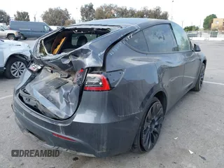2022 Tesla Model Y Performance with VIN 7SAYGDEF7NF563433, listed as a IAAI auction lot 41713557 with Not Provided miles and . Bid and sale history available at DreamBid. Image 4.
