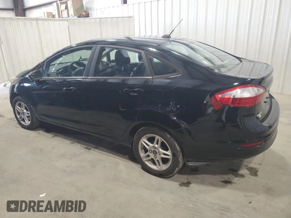 2019 Ford Fiesta SE z VIN 3FADP4BJ9KM151046, wystawiony jako Copart lot #56862255 z przebiegiem 77 002 mil mil oraz Czysty tytuł • Clean title. Historia ofert i sprzedaży dostępna na DreamBid. Obrazek 2.