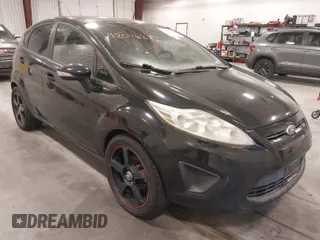 2013 Ford Fiesta SE with VIN 3FADP4EJ5DM195186, listed as a IAAI auction lot 42046227 with 137,794 mi miles. Bid and sale history available at carsss.com. Image 1.