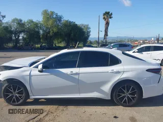2023 Toyota Camry SE with VIN 4T1T11AK8PU836864, listed as a IAAI auction lot 41933124 with 50,263 mi miles and . Bid and sale history available at DreamBid. Image 14.