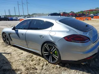 2014 Porsche Panamera S E-Hybrid with VIN WP0AD2A75EL044663, listed as a IAAI auction lot 41818381 with 44,194 mi miles. Bid and sale history available at carsss.com. Image 14.