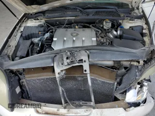 2004 Cadillac DeVille DTS z VIN 1G6KF57924U185324, wystawiony jako Copart lot #58222205 z przebiegiem 182 640 mil mil oraz Szkoda całkowita • Salvage title. Historia ofert i sprzedaży dostępna na DreamBid. Obrazek 11.