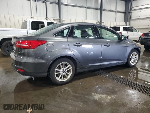 2018 Ford Focus SE z VIN 1FADP3FE4JL289830, wystawiony jako Copart lot #53350265 z przebiegiem 72 963 mil mil oraz Szkoda całkowita • Salvage title. Historia ofert i sprzedaży dostępna na DreamBid. Obrazek 3.
