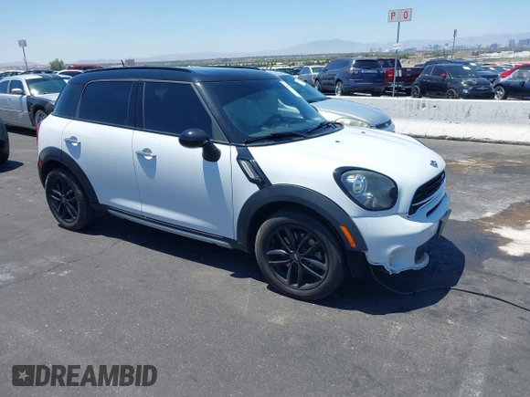 2015 MINI Countryman S with VIN WMWZC3C58FWT05613, listed as a IAAI auction lot 42374870 with 124,214 mi miles and . Bid and sale history available at DreamBid. Image 1.