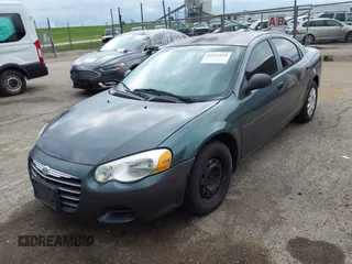 2004 Chrysler Sebring LX with VIN 1C3EL46X14N167733, listed as a IAAI auction lot 42147124 with 166,358 mi miles and . Bid and sale history available at DreamBid. Image 2.
