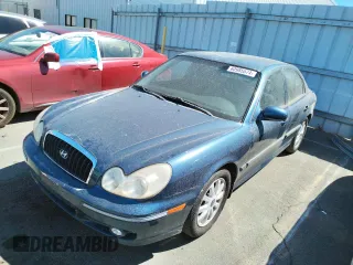 2002 Hyundai Sonata GLS with VIN KMHWF35H12A702457, listed as a Copart auction lot 60985574 with 99,698 mi miles and Salvage Title. Bid and sale history available at carsss.com. Image 1.