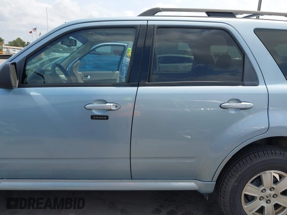2009 Mercury Mariner with VIN 4M2CU81G09KJ06987, listed as a IAAI auction lot 42120169 with 142,363 mi miles and . Bid and sale history available at DreamBid. Image 14.